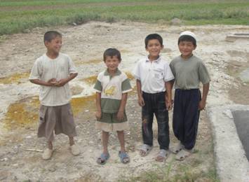 Children playing on obsolete pesticides